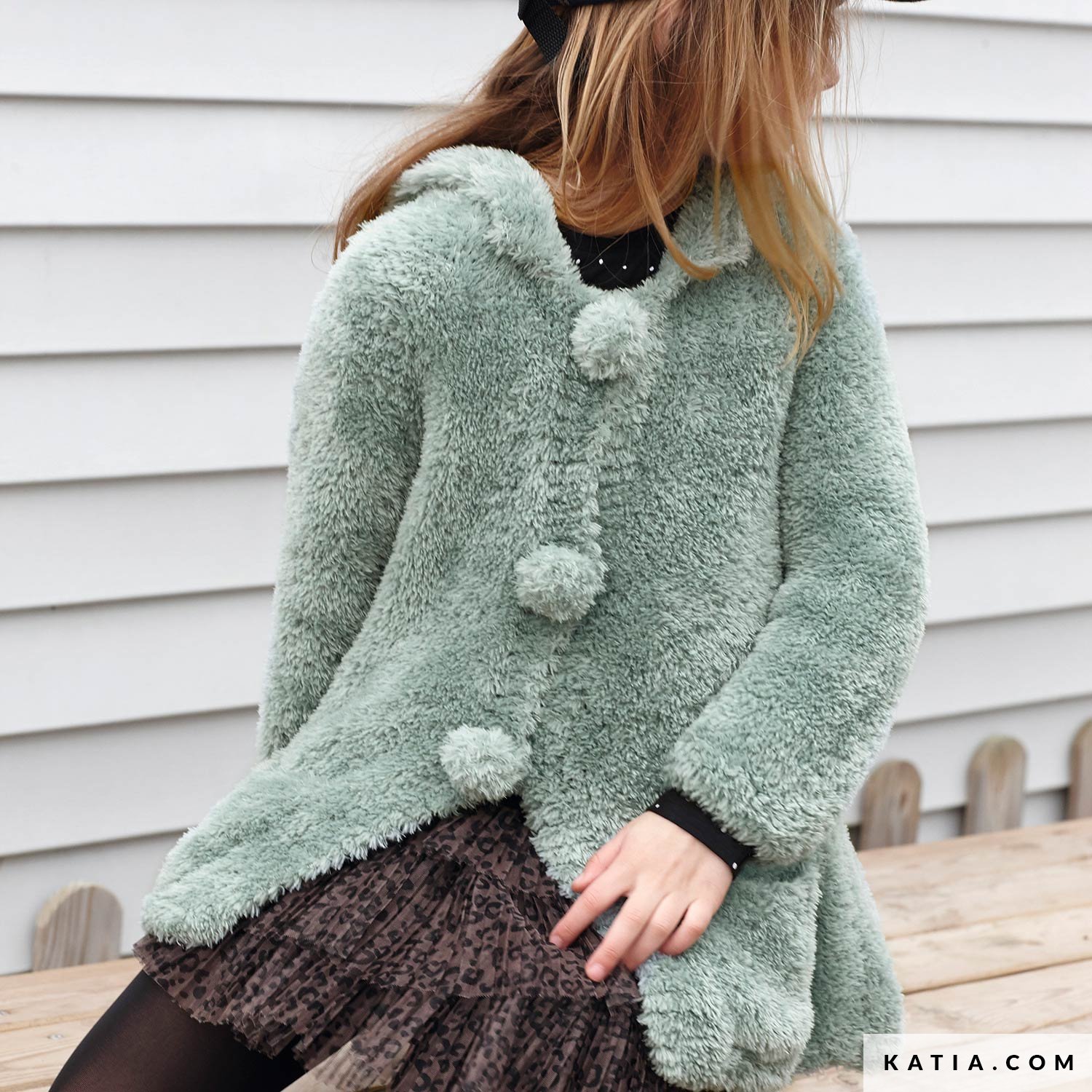 Furry coat with pockets in Perline
